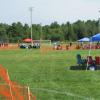 56-A lot of games going on and tents set up around and between the fields