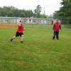 28-Phil Cayford pitching for Blue and his players